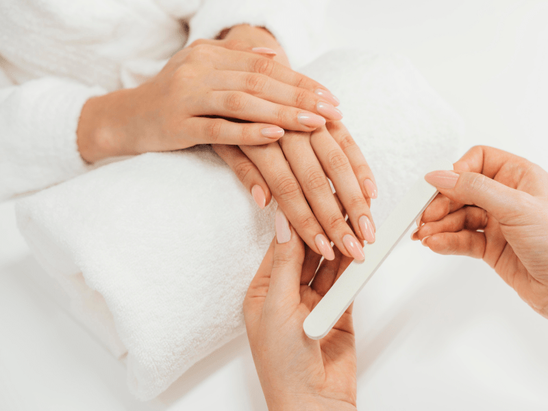 50415e44 healthy beautiful manicure manicurist with file 2 min.png